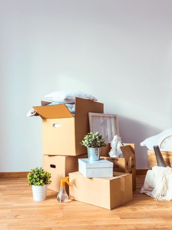 cardboard-boxes-and-cleaning-things-for-moving-into-a-new-home-1573953252